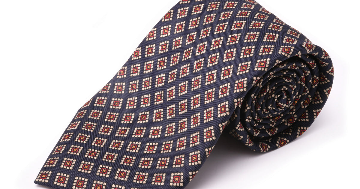 Madder Print Silk Tie in Navy with Red, Buff and Orange Diamond Pattern - Fort Belvedere