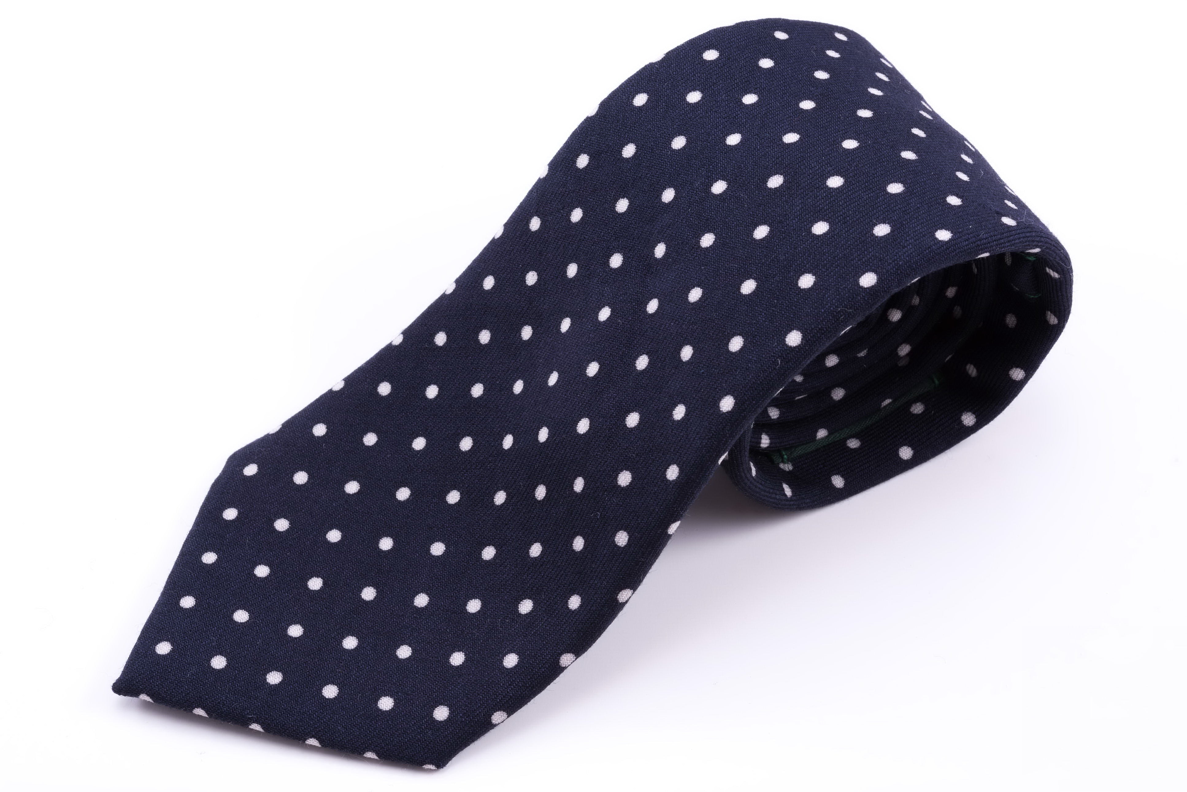 white tie with blue polka dots