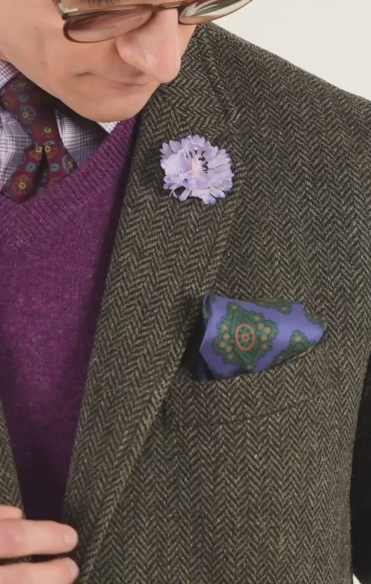 Video of a blue cornflower boutonniere 