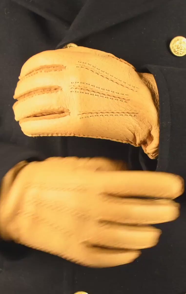 Video of yellow leather gloves