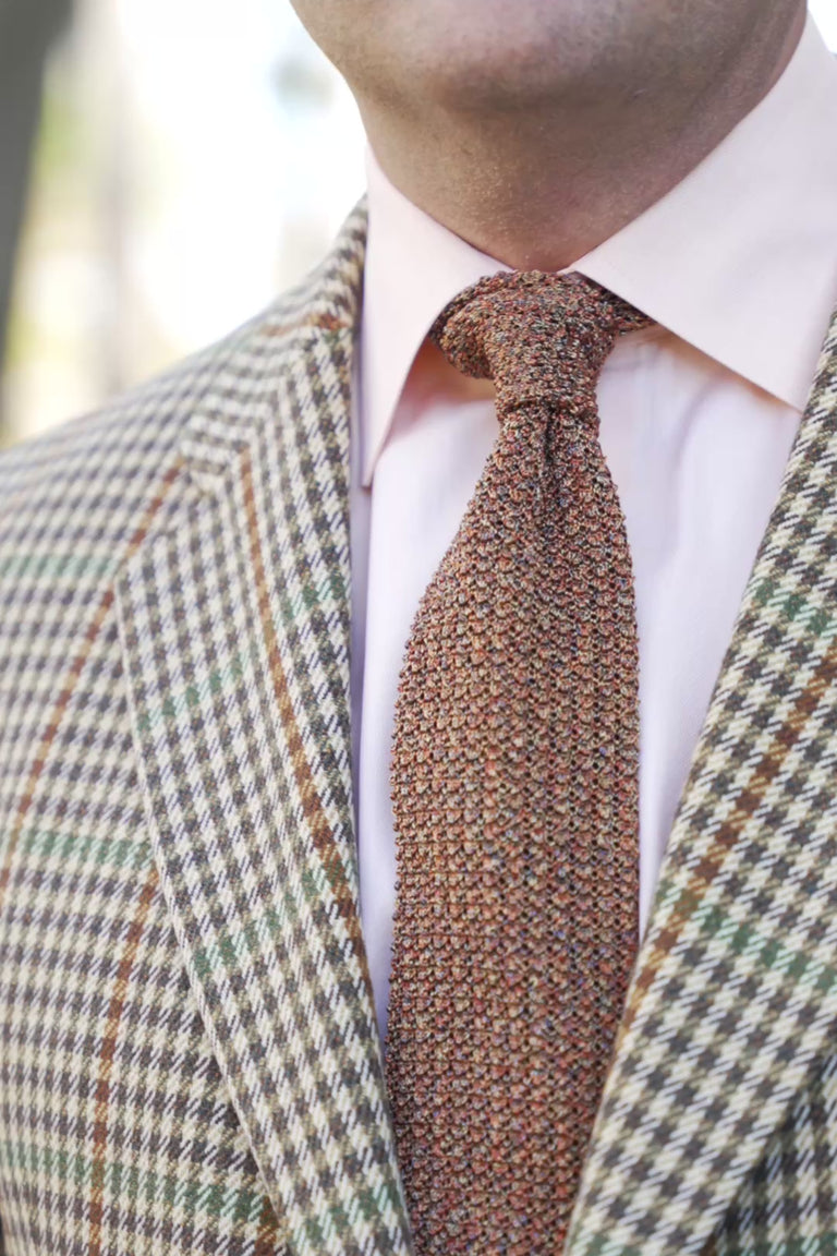 Looping clips of a silk knit tie