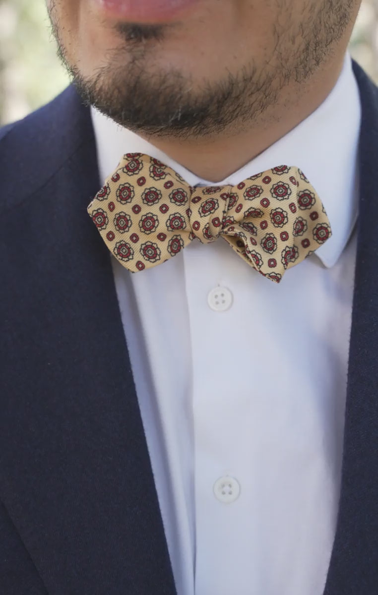 Looping video of models wearing the bow tie