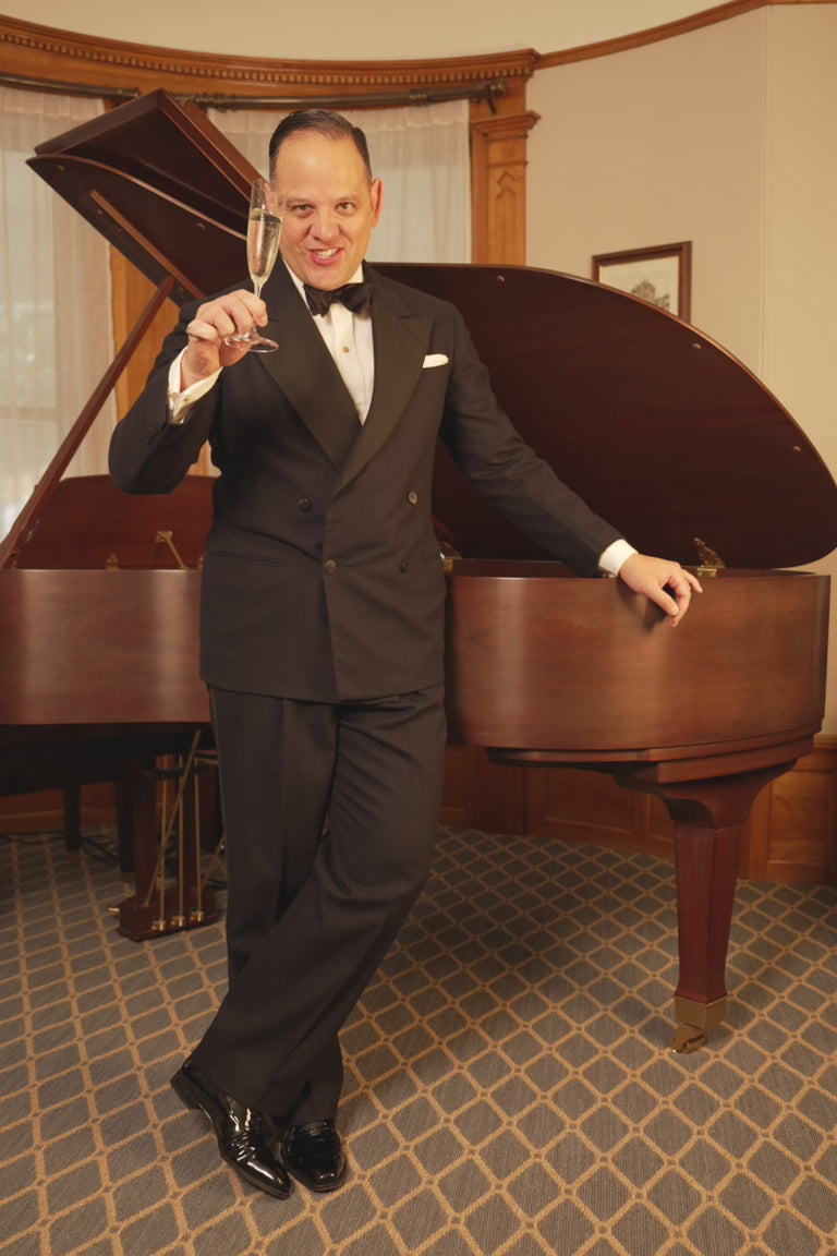 Looping images of a man in black tie