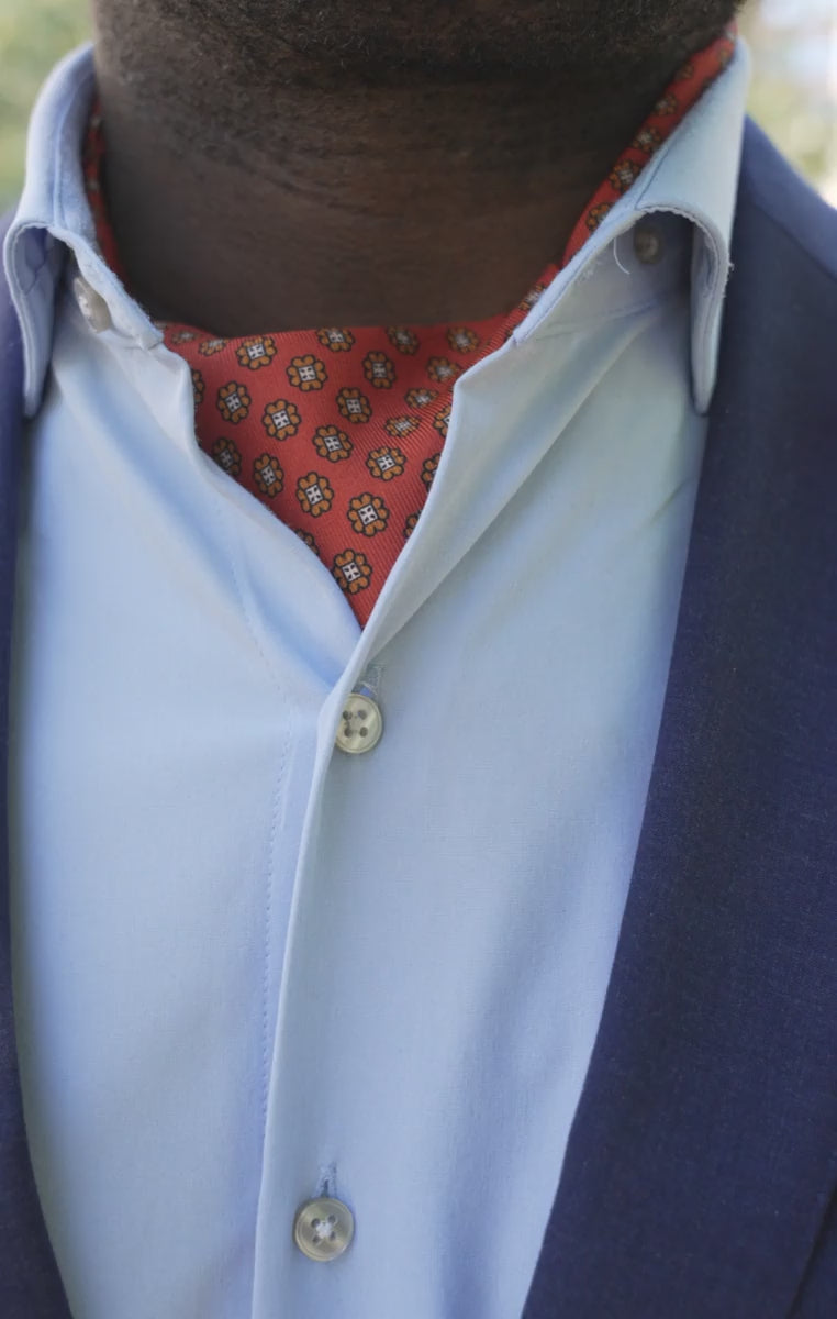 Looping videos of the models wearing the ascot