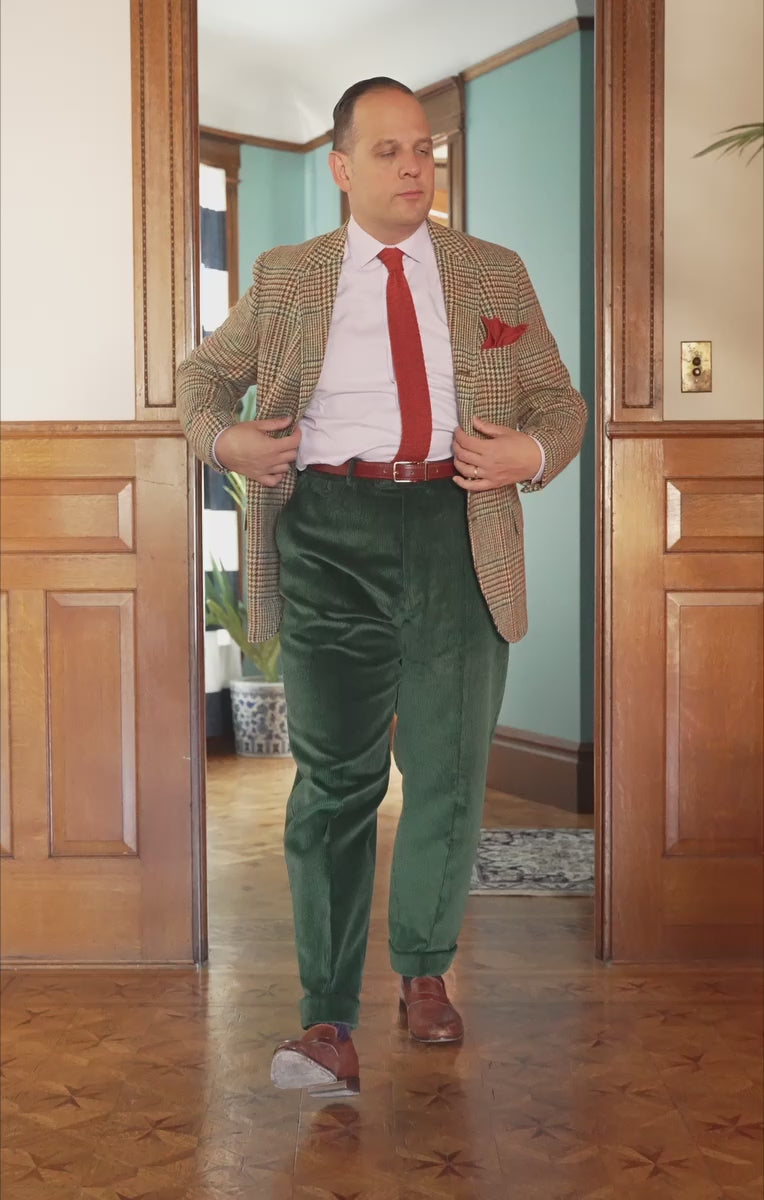 Raphael walking and sporting the British Racing Green corduroy from Fort Belvedere.