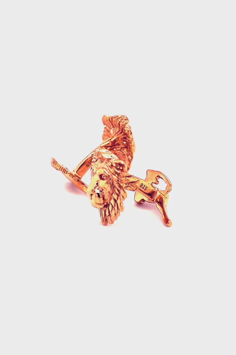 Rotating video of rose gold lion head cufflinks
