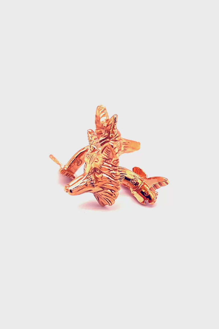 Rotating video of rose gold fox head cufflinks