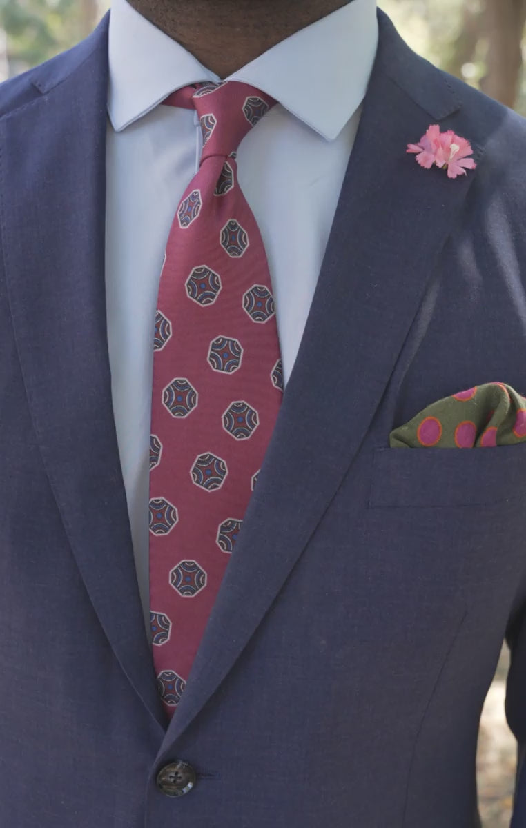 Looping video of models wearing the tie