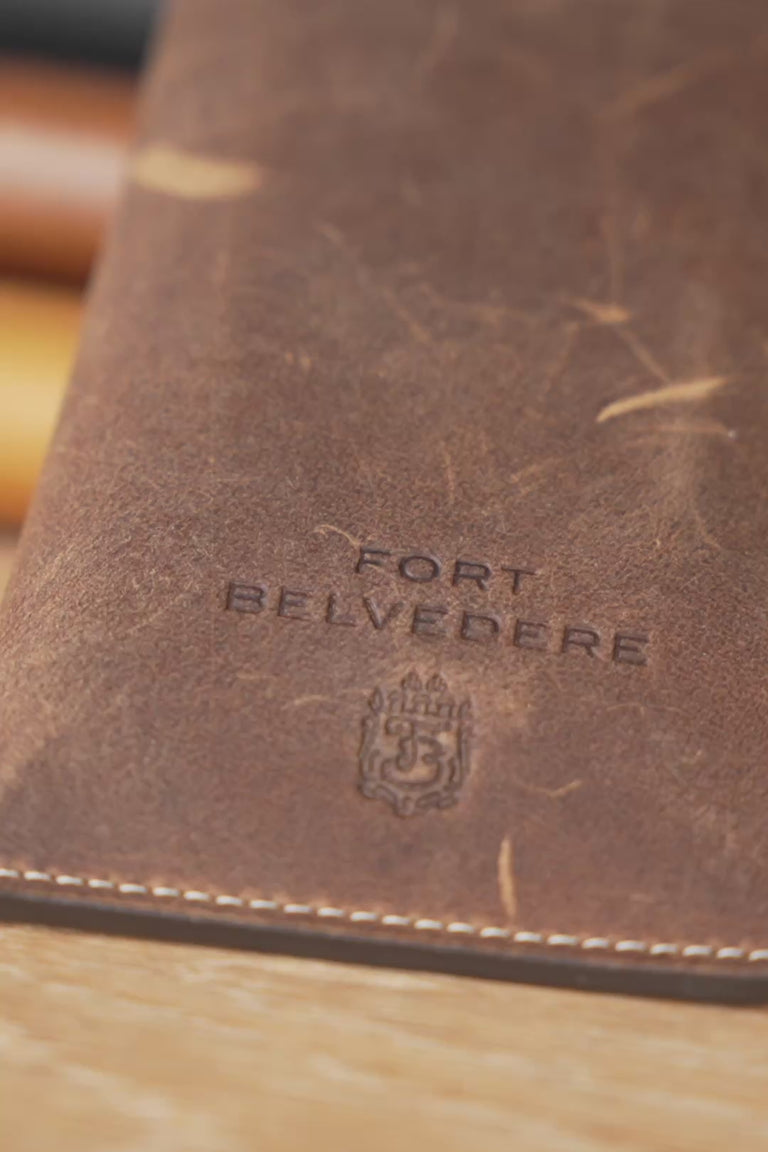 Looping video of a Fort Belvedere Antique Mahogany & Blue Suede Leather Soft Eyeglass Case