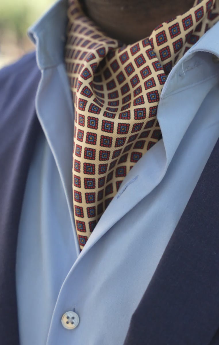 Looping video of models wearing the ascot