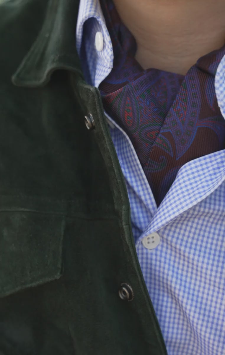 Looping video of models wearing the ascot with different outfits