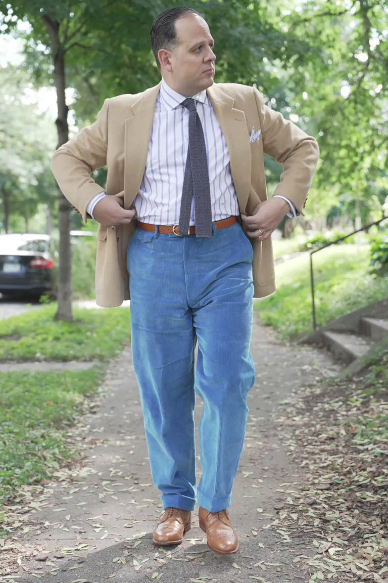 Repeating video of a man wearing the Fort Belvedere Dark Brown Natural Veg & Cognac Tan Reversible Leather Belt